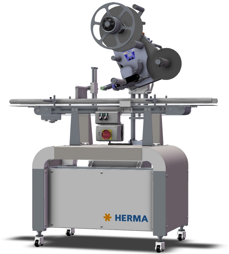 自动贴标机，配有卷轴和控制单元，安装在一个稳固的底座上。