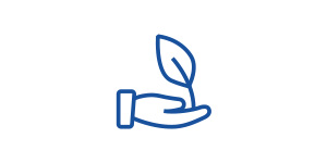 Eine Hand hält ein Blatt, das Wachstum und Natur symbolisiert.