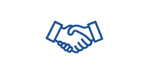 Zwei Hände, die sich zur Begrüßung schütteln, symbolisieren Zusammenarbeit und Vereinbarung.